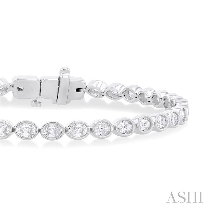 OVAL SHAPE EAST-WEST BEZEL SET DIAMOND TENNIS BRACELET