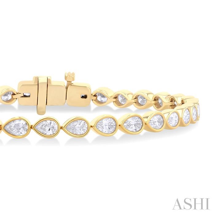 PEAR SHAPE EAST-WEST BEZEL SET DIAMOND TENNIS BRACELET