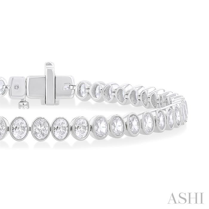 OVAL SHAPE NORTH-SOUTH BEZEL SET DIAMOND TENNIS BRACELET